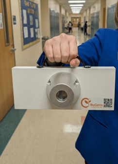 Teacher holding station in hallway